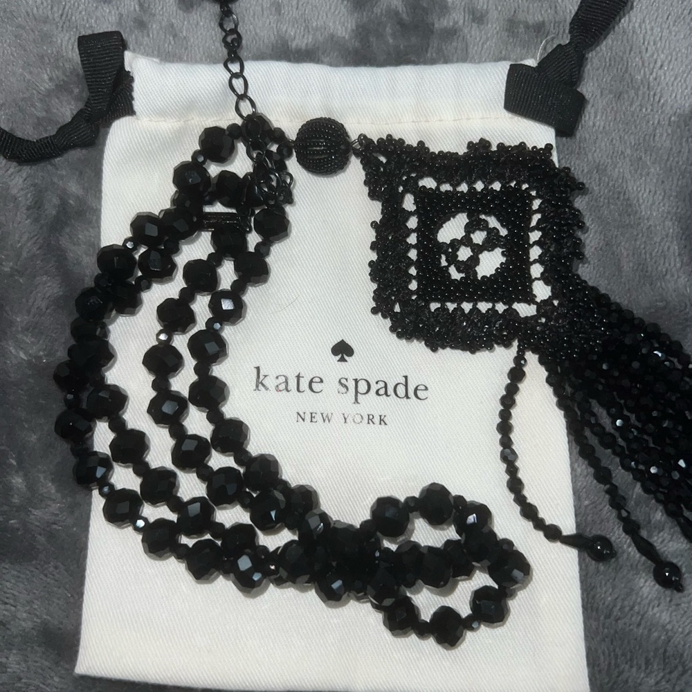 Beautifully black shiny faceted beaded long sleeve necklace !! A STATEMENT PIECE